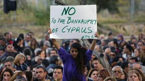 BANK HEIST: Cypriots protest after their bank accounts were raid to pay for the Troika's loan