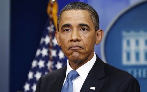 STAYING GLUM: Obama ponders over arming the Syrian rebels